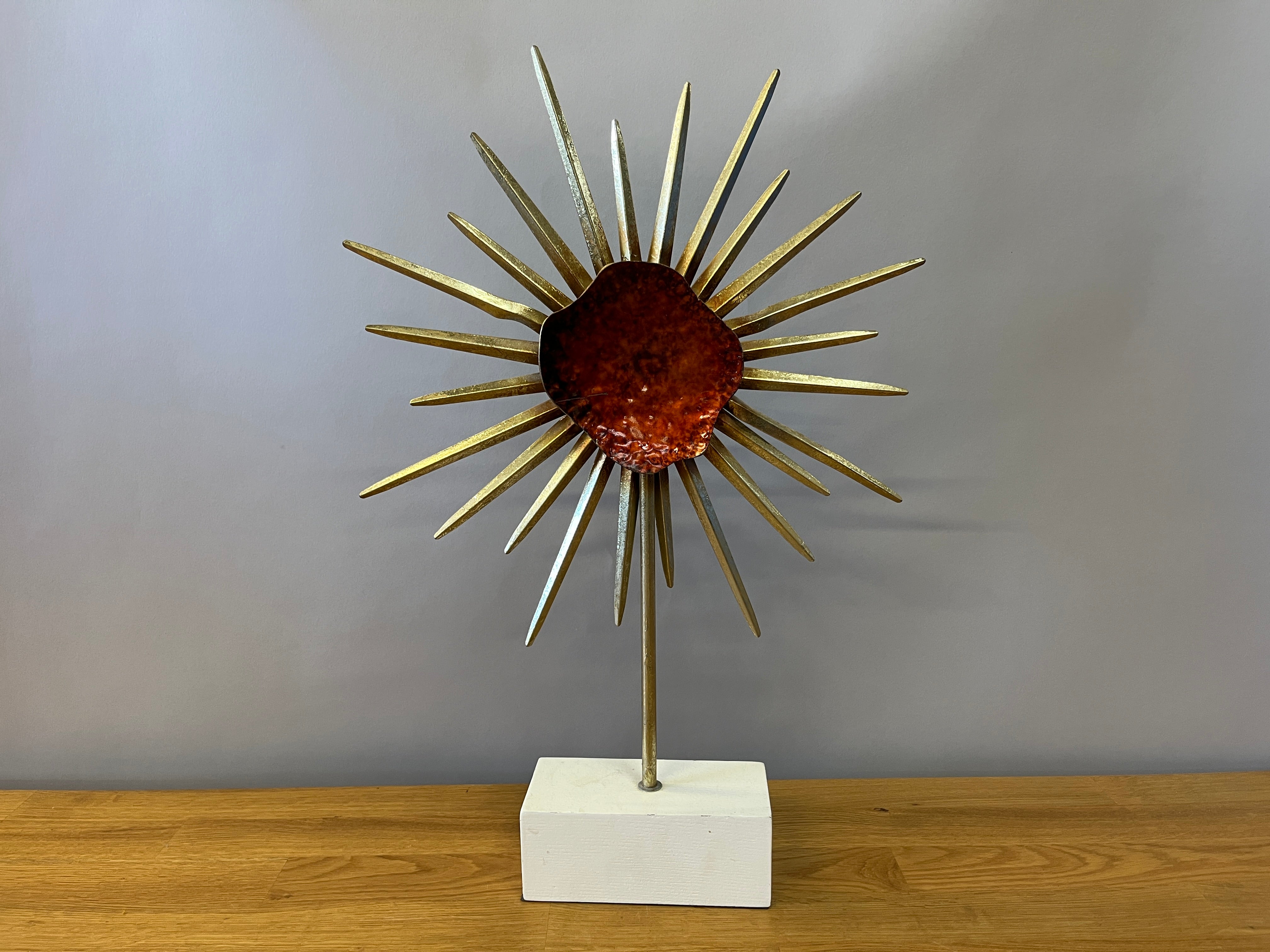 Gold Starburst Statue