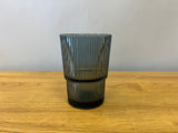 Dark blue fluted drinking glass