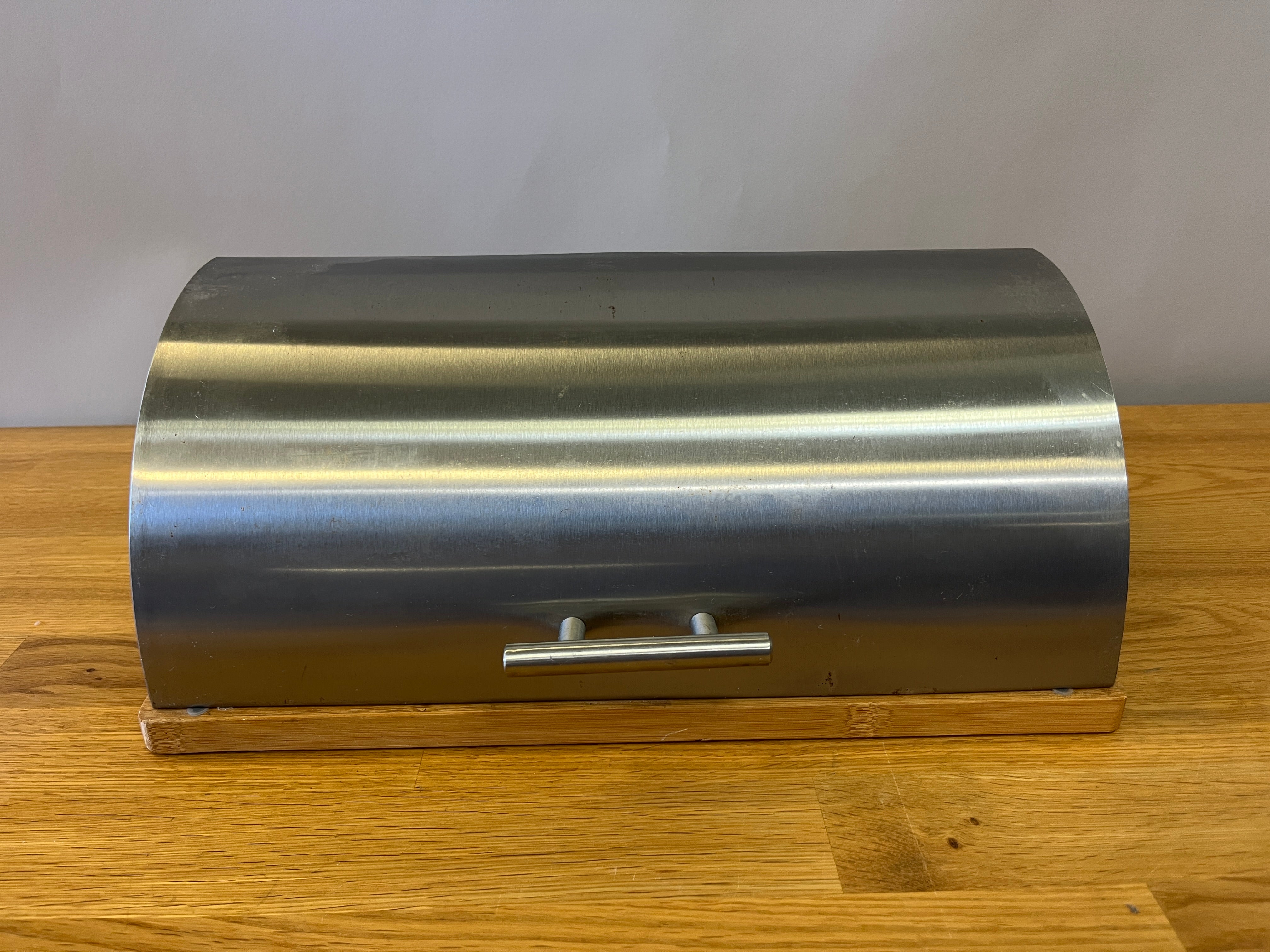 Silver Half circle bread box with wood base