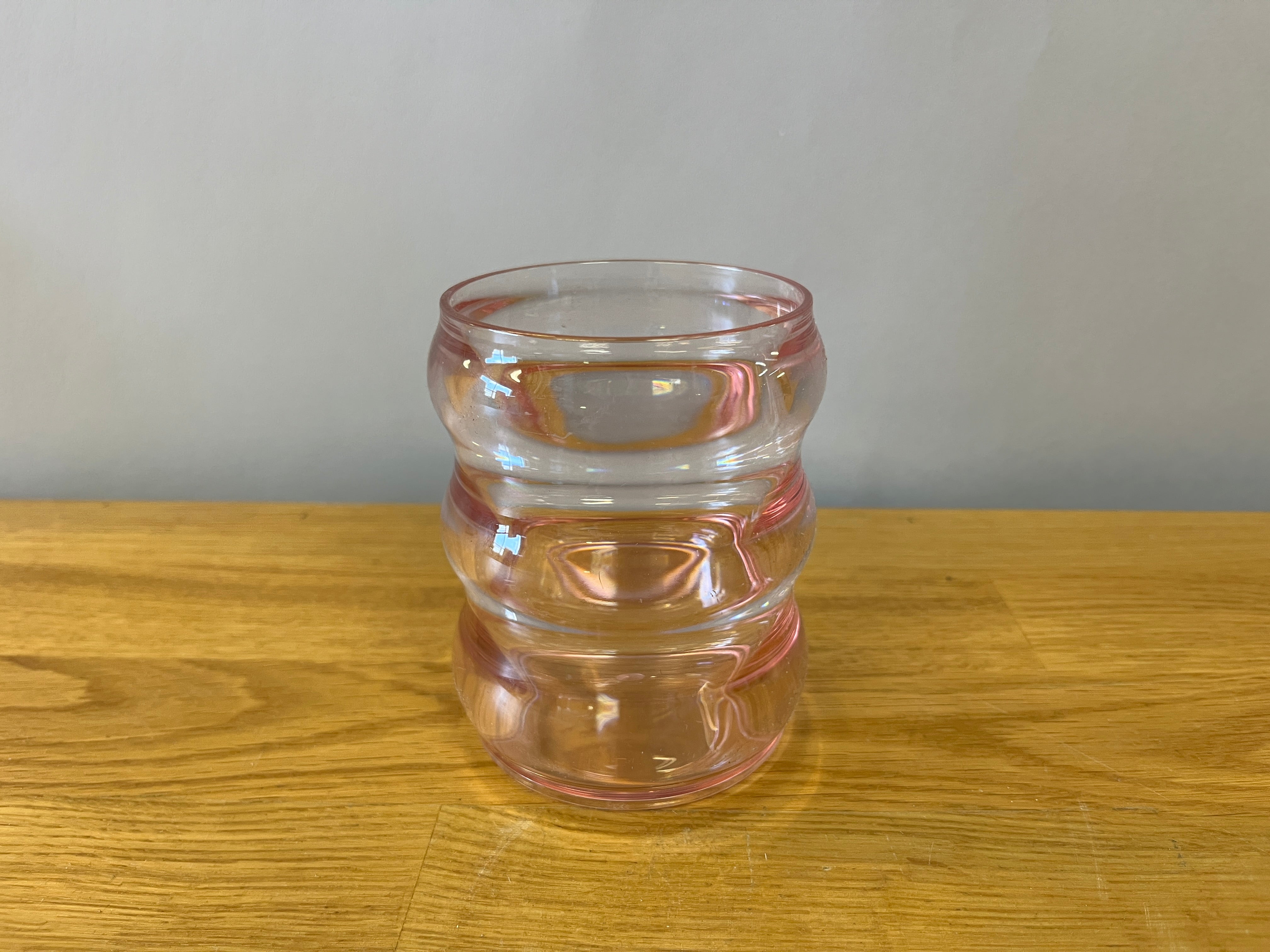 Pink plastic wavy glass