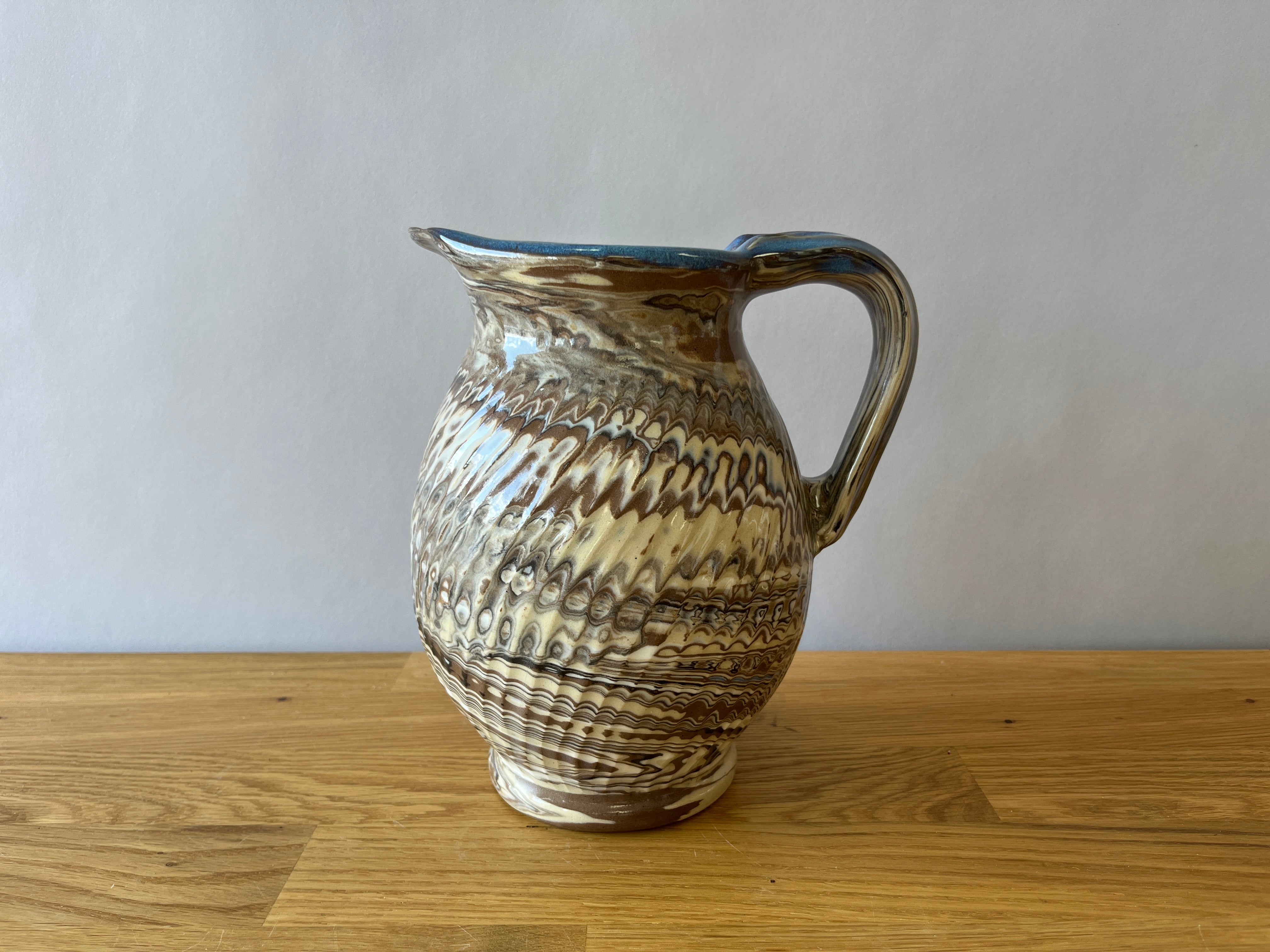 Brown and blue pitcher