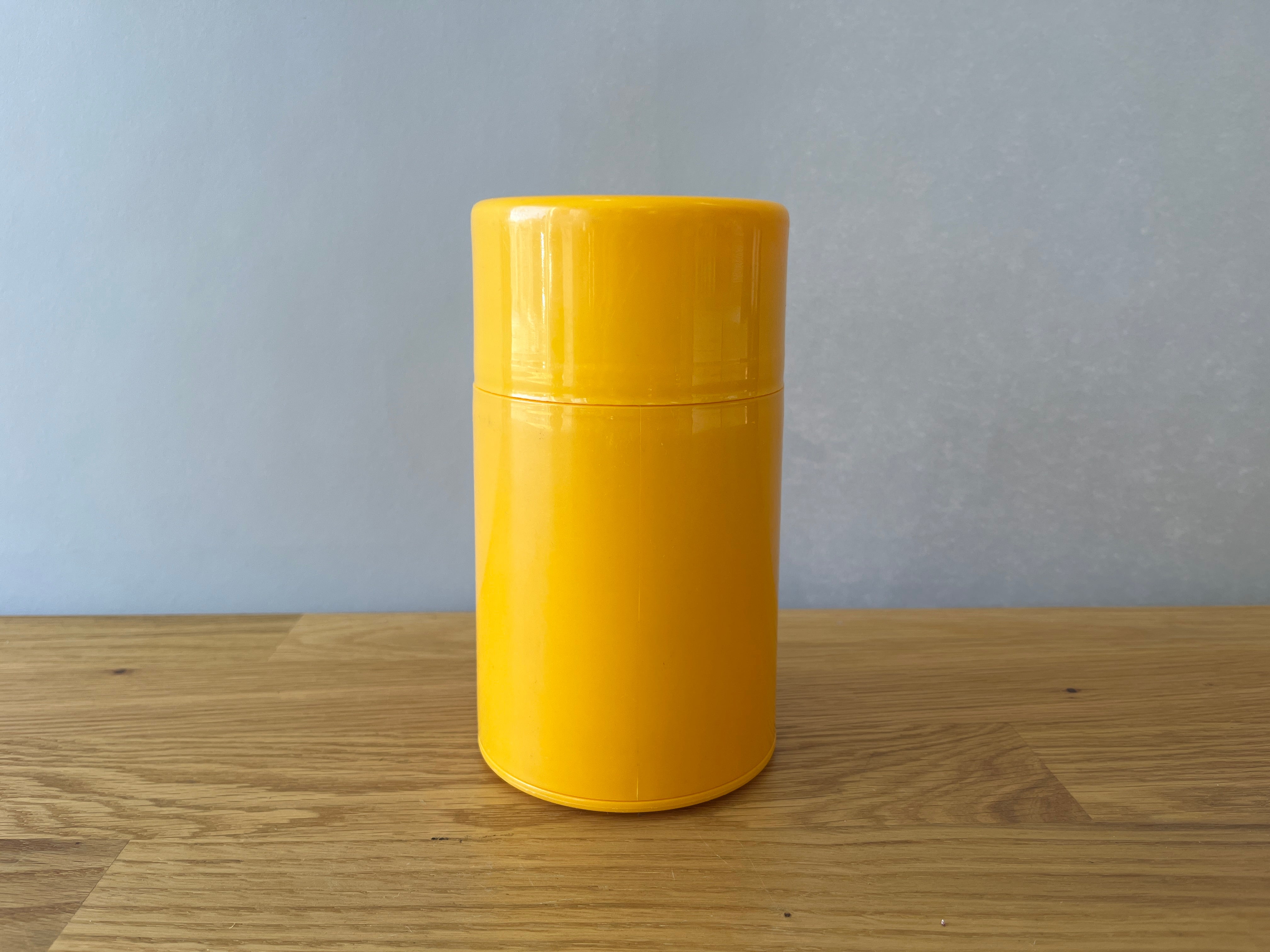 Yellow thermos with lid
