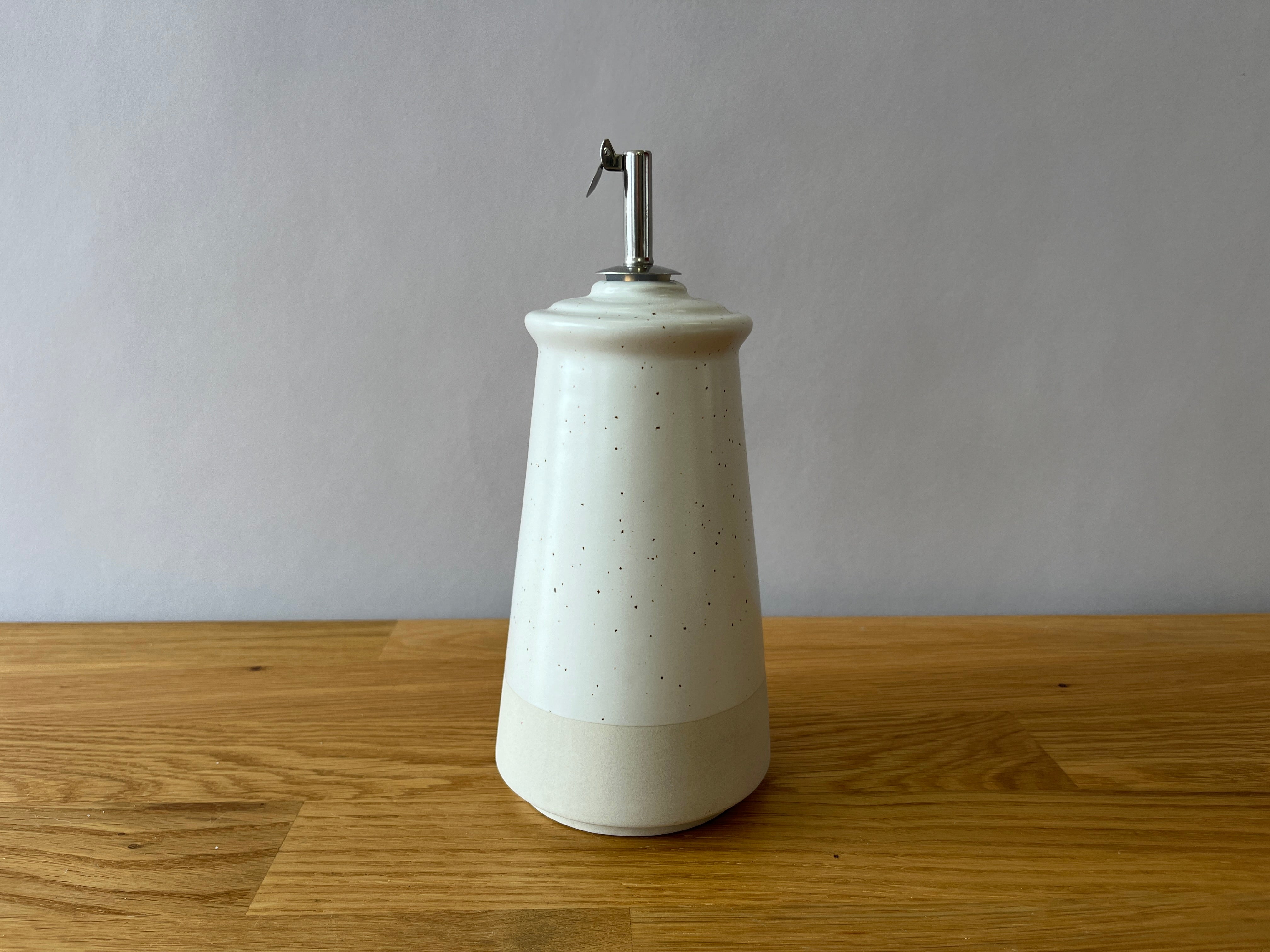 off white speckled olive oil dispenser
