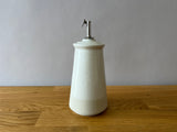 off white speckled olive oil dispenser
