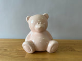 pink ceramic teddy bear statue
