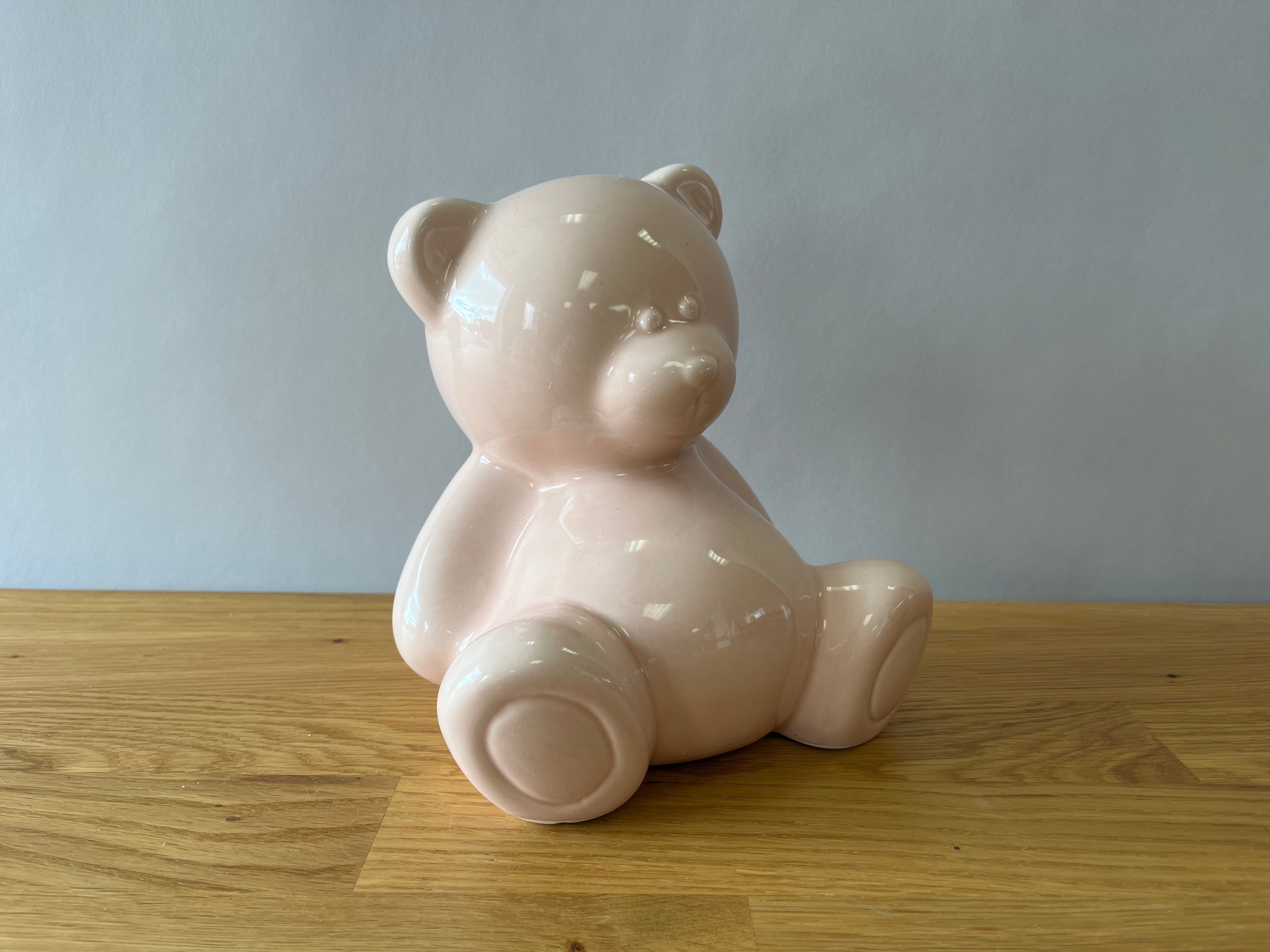 pink ceramic teddy bear statue