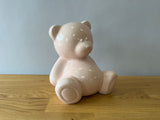 pink ceramic teddy bear statue