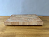 Cutting board with feet