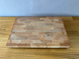 Cutting board with feet