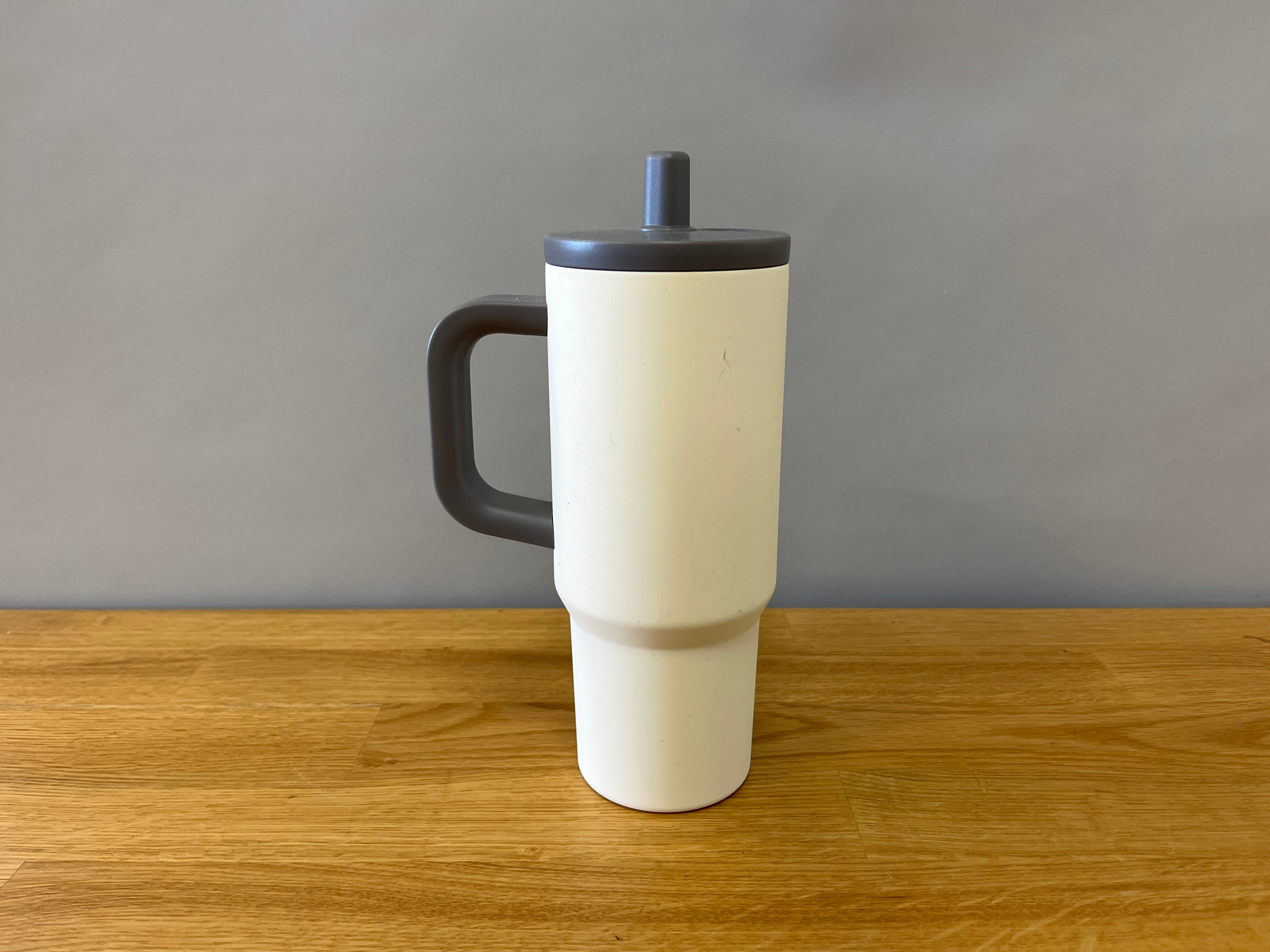 Cream and Grey Travel Bottle