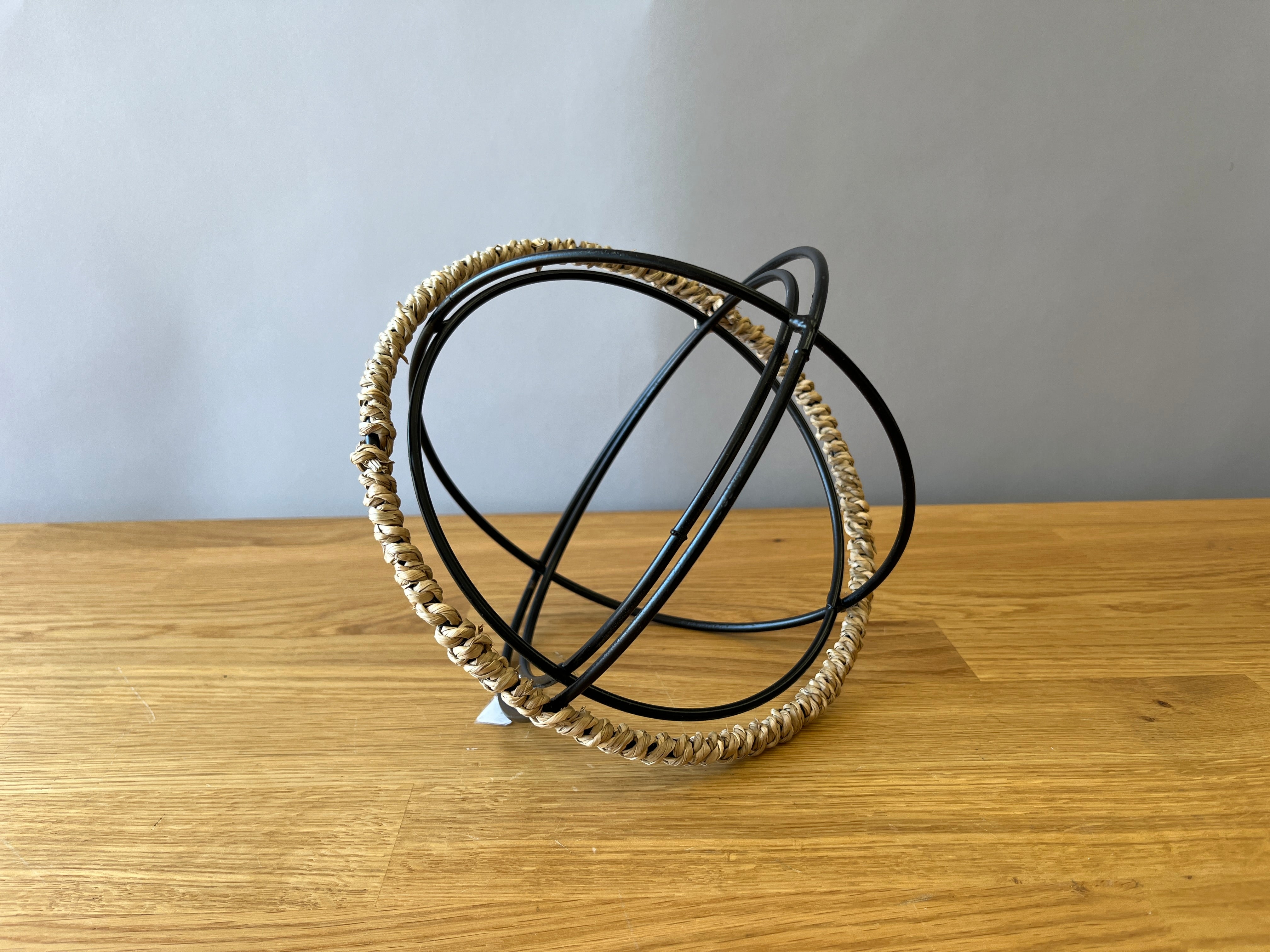 metal bar with whicker edge decor piece