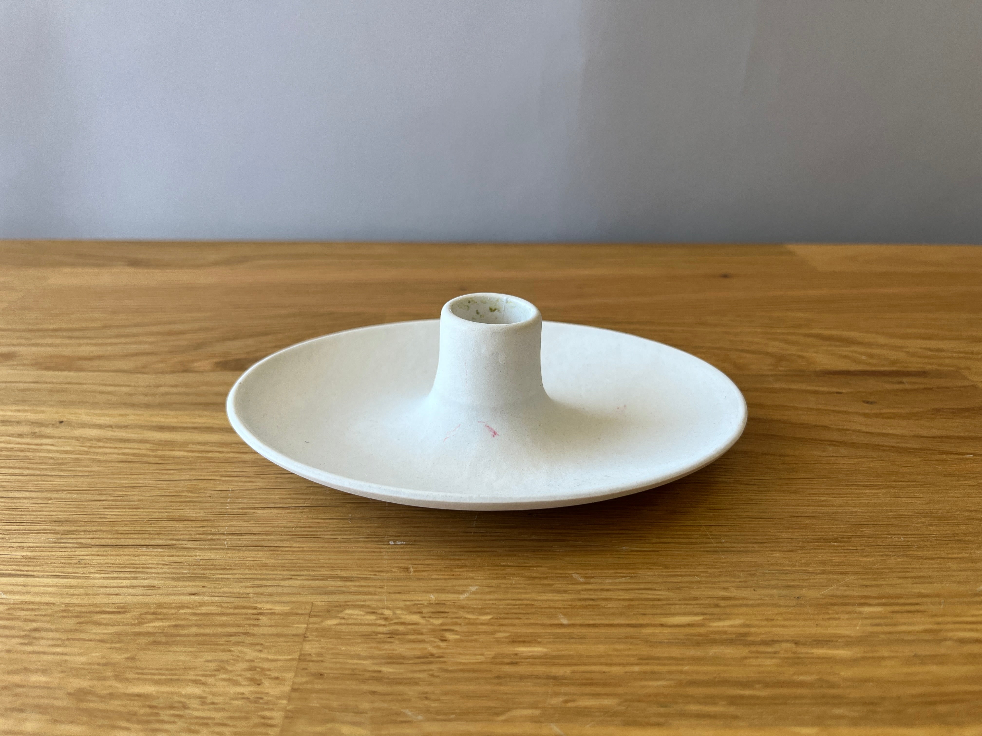 White ceramic tapered candle holder