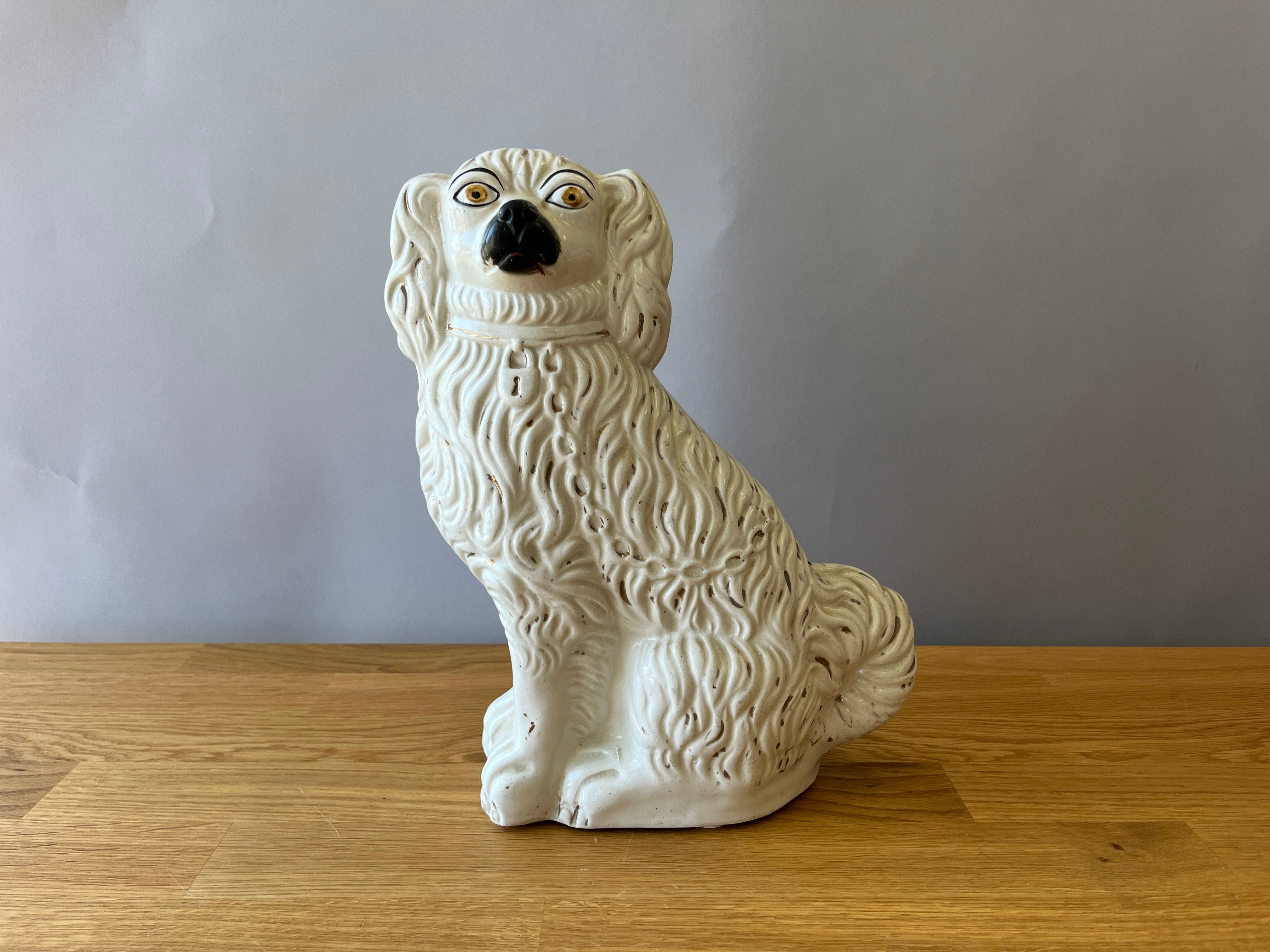 Large white ceramic dog