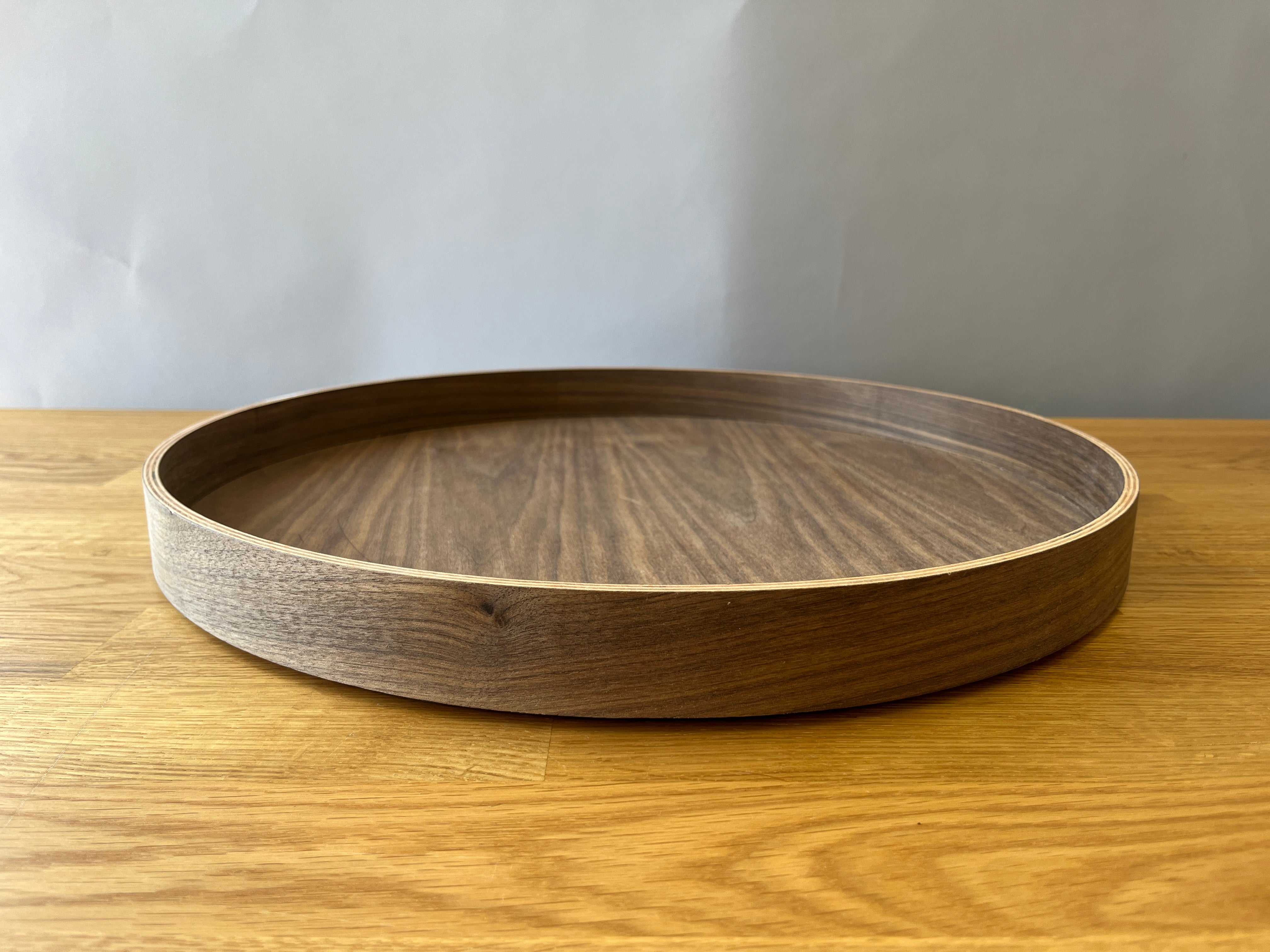 dark wood toned circular tray