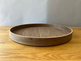 dark wood toned circular tray