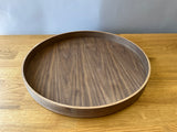 dark wood toned circular tray
