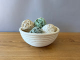 wicker bowl with popperi balls