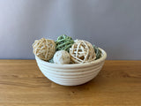 wicker bowl with popperi balls