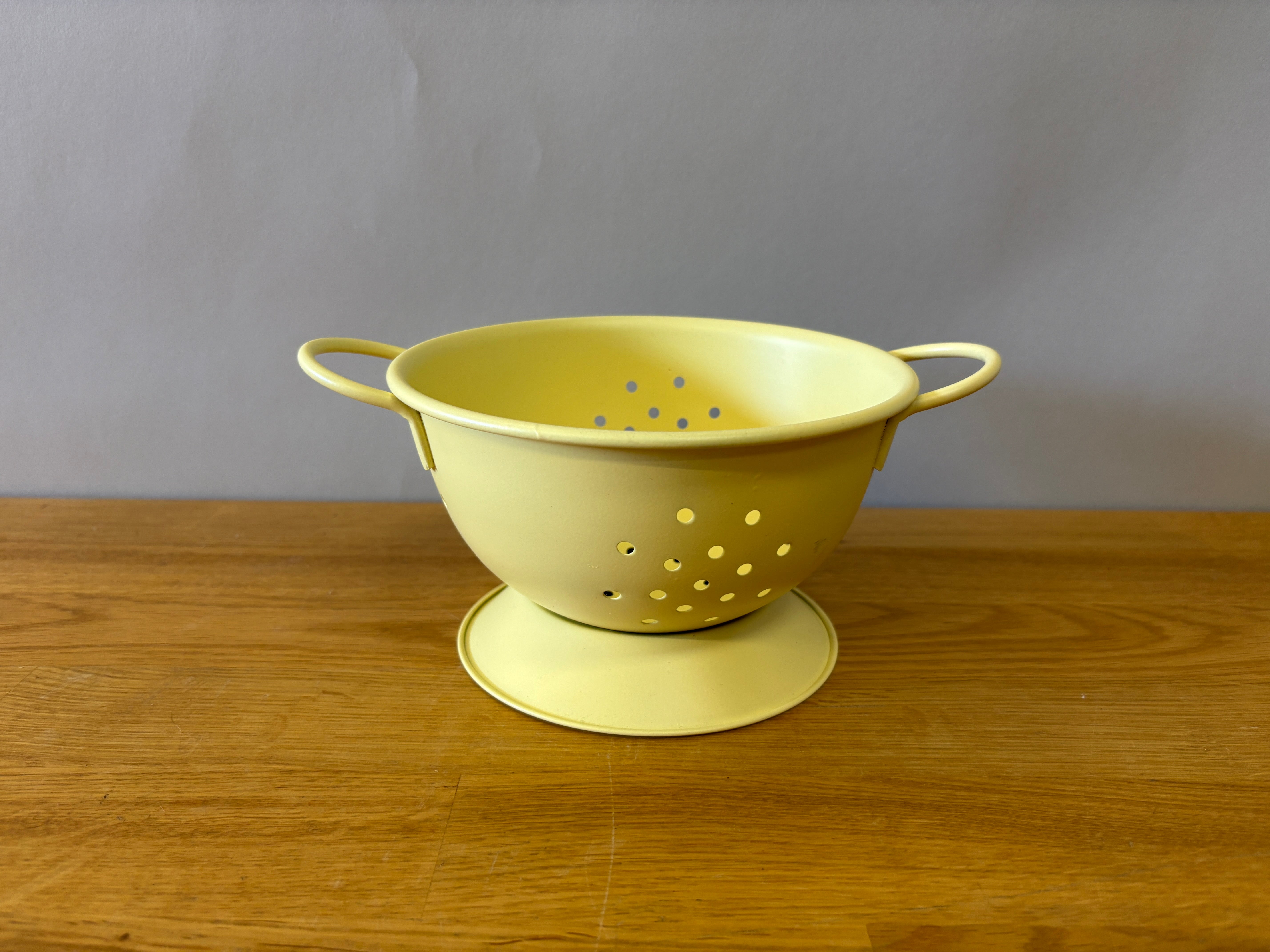 Yellow Metal Strainer