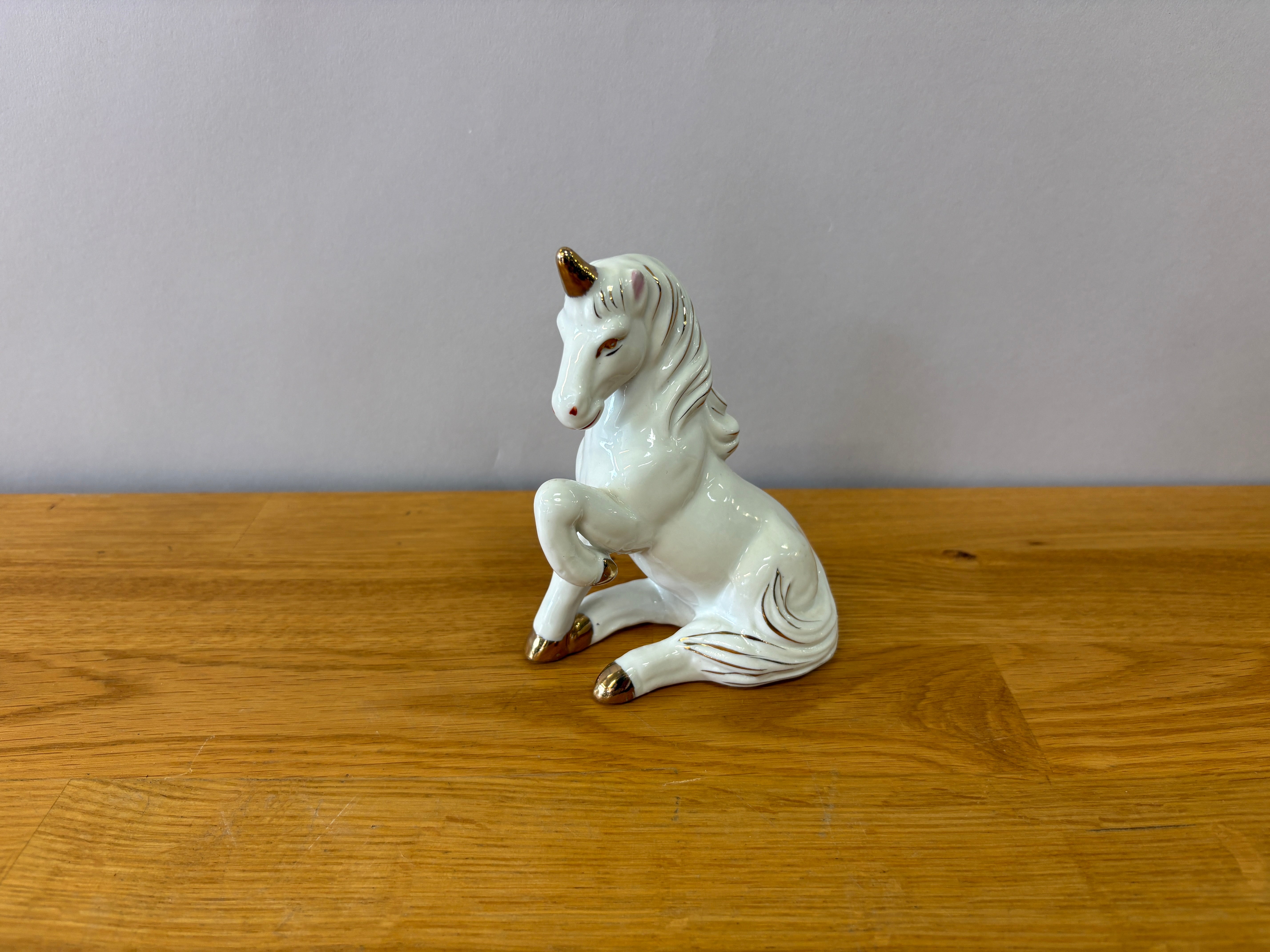 White Sitting Unicorn