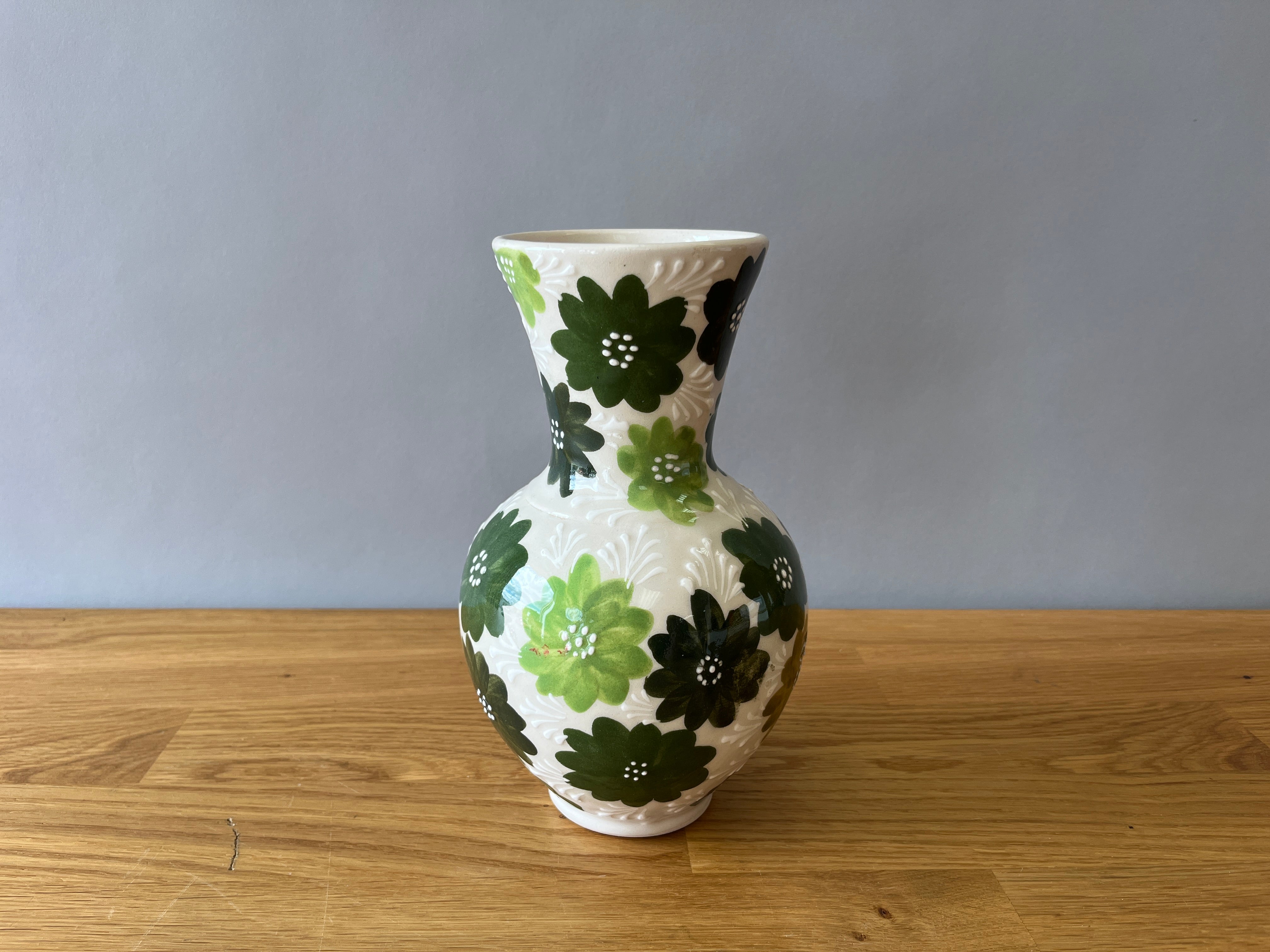 White Vase with Green Flowers